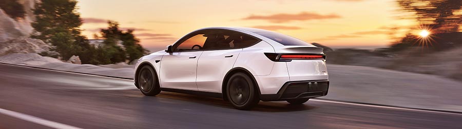 2025 Tesla Model Y super ultrawide wallpaper thumbnail.